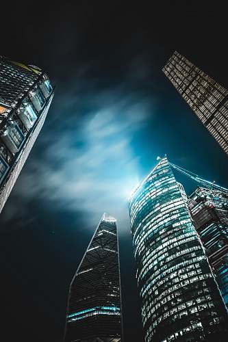 high rise high-rise buildings under black sky urban